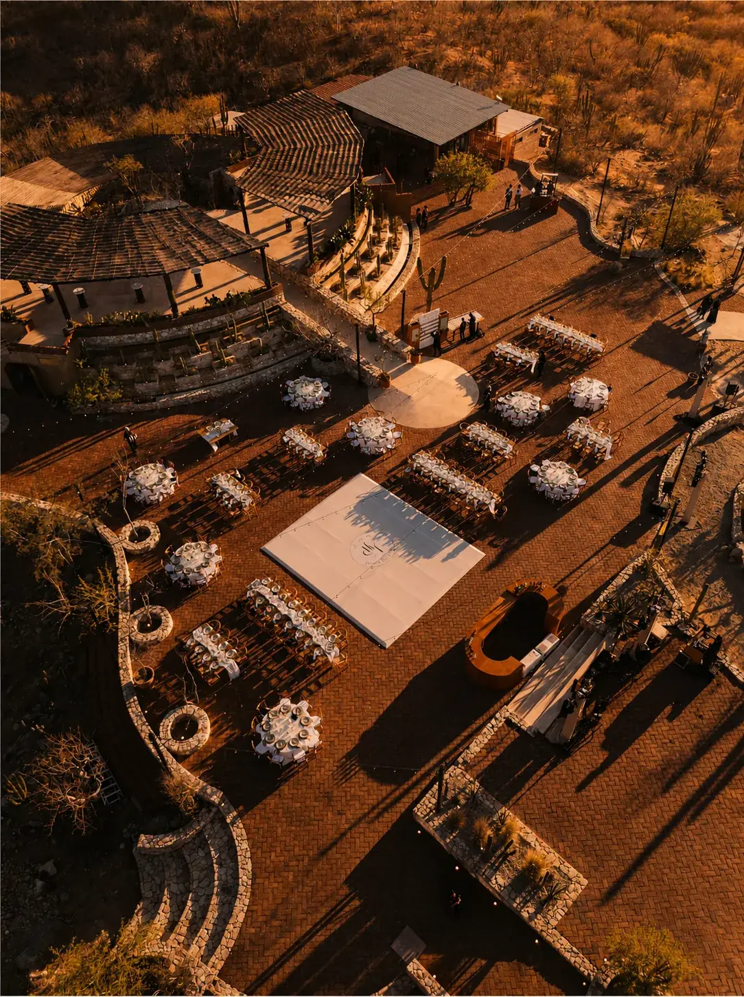 Aerial view of the estate courtyards with tables set for a celebration