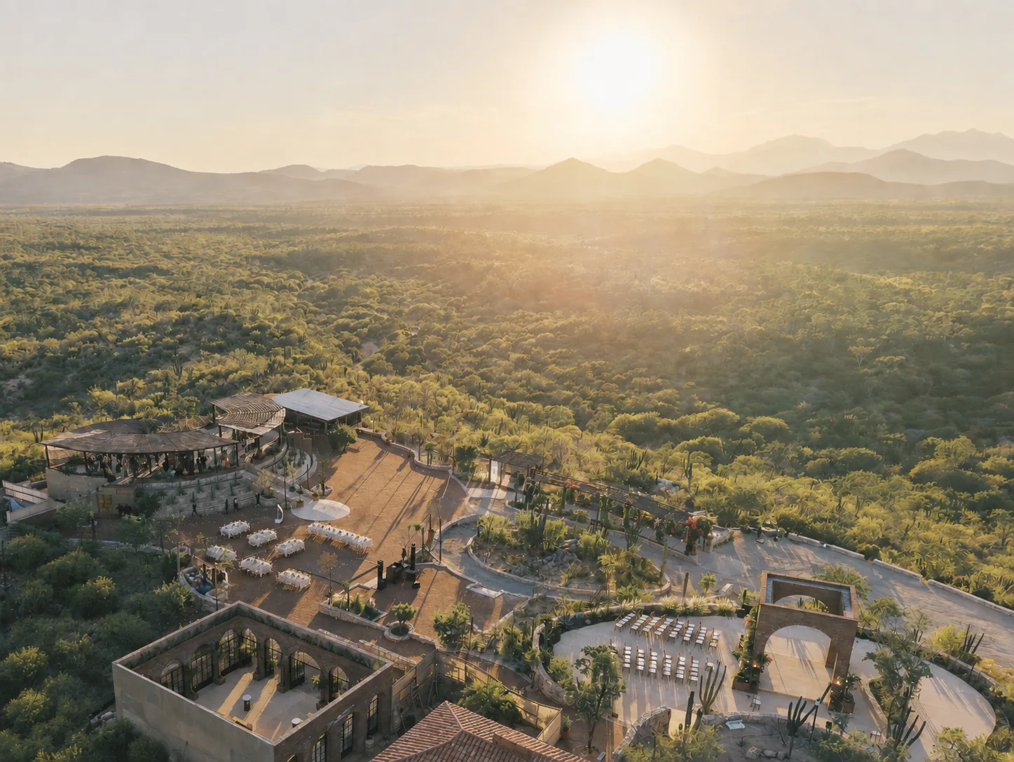 The estate seen from above at sunset, surrounded by twenty-six acres of desert